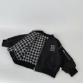 Boys black reversible bomber jacket with letter B embroidery and checkered lining - 90cm / Black