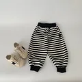 Classic black and white striped cotton joggers for boys with elastic waist and P-patch - 120cm / Black & White Stripes