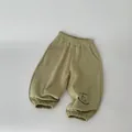 Kids casual khaki jogger pants with elastic waist and cute cartoon graphic print - Green / 100cm