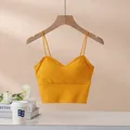 Bright yellow spaghetti strap camisole with built-in pads and a seamless V-neck design - S / Turmeric