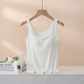 White ribbed square neck camisole with built-in pads on a wooden hanger with flower - S / White