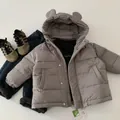 Flat lay of kids 3-piece hooded down jacket set with DuPont Teflon fabric and sneakers - Gray / 90cm