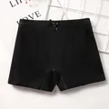 Girls black cotton safety shorts with a small ribbon bow for summer daily wear - M / Black