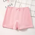 Pink cotton safety shorts for girls featuring a cute silk bow and elastic waistband - M / Light Pink