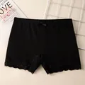 Pantaloncini di sicurezza neri in cotone per bambina con pizzo e piccolo fiocco - M / Nero
