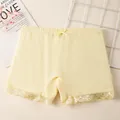 Girls yellow cotton safety shorts with delicate bow and white lace trim detail - M / Yellow