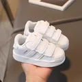 Baskets blanches classiques pour enfants avec scratchs et design emblématique à rayures - EU 22 / Blanc