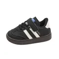 Scarpe sportive classiche bianco e nero per bambini con suola in gomma e chiusura a strappo - 22 / Nero