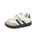 Sneaker per bambini bianche e verdi con suola in gomma e cinturino in velcro regolabile - 22 / Verde