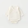 Detailed view of bamboo fiber baby bodysuit with 3D sheep embroidery and side snap buttons - 52 / Creamy White Lamb