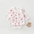 Detail of newborn cotton bodysuit with red Fu character prints and tie-up neckline - 52 / Hundred Blessings