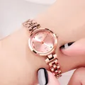 Elegant rose gold women's watch with crystal-set bezel and polished metal link strap - Rose Gold Case Pink Dial