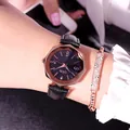 Women's starry blue watch with black leather strap and rose gold beaded bracelet - Black Rose Gold Dial