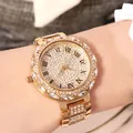 Montre quartz luxe pour femme dorée avec cadran étoilé serti de cristaux étincelants - Or