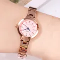 Women's quartz watch with rose gold mesh band, pink dial, and crystal markers - Rose Gold Pink Dial