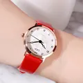 Elegant GEDI women's watch with red leather strap and floral pattern dial on wrist - Red Strap Rose Gold Case White Dial