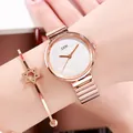 Elegante reloj de mujer en oro rosa con pulsera de estrella y esfera de metal cepillado - Caja Oro Rosa Esfera Blanca