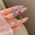 Long tassel earrings in silver with light blue stones and sparkling rhinestones - E2215 Blue / 925 Silver Needle