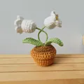 Handmade crochet Lily of the Valley potted plant with two white flowers and green leaves - White Lily of the Valley Potted Plant Finished