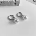Minimalist silver hoop earrings with a large round white pearl drop for women - Pearl Pendant / Silver