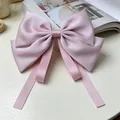 Elegant light pink oversized satin bow hair clip with long ribbons for girls - Large Ribbon Bow / Pink