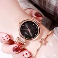 Reloj de cuarzo para mujer en oro rosa con esfera negra y pulsera de estrella a juego - Caja Oro Rosa Esfera Negra