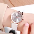 Minimalist women's quartz watch featuring a rose gold case and white leather strap - White
