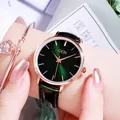 Elegant women's watch with dark green sunburst dial and rose gold case on leather strap - Forest Green