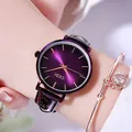 Fashionable women's watch featuring a sunray purple dial and matching purple leather strap - Violet
