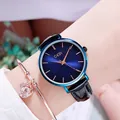 Women's quartz watch with blue sunburst dial and black leather strap with rose gold accents - Dazzling Blue