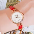 Women's fashion watch with red leather strap and rose gold case on a wrist - Rose Gold Case White Dial Red Strap