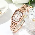 Elegante roségoldene achteckige Quarzuhr für Damen mit einer funkelnden Diamantlünette - Roségold Gehäuse Weißes Zifferblatt