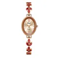 Close-up of luxury oval quartz watch with rose gold strap and red gemstone inlays - Rose Gold Dial Red Strap