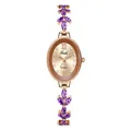 Detailed close-up of oval quartz watch dial with purple marquise gemstones and rose gold finish - Rose Gold Dial Purple Strap