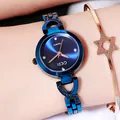 Montre quartz bleue élégante avec cristaux et bracelet en forme de S pour femme - Bleu Éblouissant