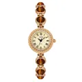 GEDI retro women's chain watch featuring golden metal links and brown cat-eye stones - IP Gold Case Light Gold Dial Amber Bead Strap