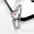 Women's heart-shaped silver quartz watch with pink dial and rhinestone link bracelet - Silver Case Pink Dial