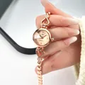 Elegant rose gold watch for women featuring heart-shaped chain strap with sparkling crystals - Rose Gold Case Rose Gold Dial