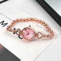Detail of rose gold heart bracelet watch with pink pearl dial and quartz movement - Rose Gold Case Pink Dial