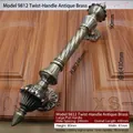 Detailed view of antique bronze door handle Model 9812 with ornate twisted grip texture - Total Length 430mm / Twist Handle Extended - 9812 / Antique Bronze