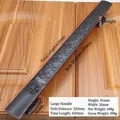 Macro shot of 420mm antique bronze door handle with floral relief on a wooden background - Total Length 420mm / Chinese Floral Relief - 9889 / Black Red Bronze