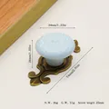 Detail view of floral ceramic cabinet knob with blue rose pattern and bronze base dimensions - Antique Bronze Base Light Blue