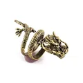 Macro detail of vintage bronze dragon ring showing intricate scales and dragon head design - Vintage Bronze