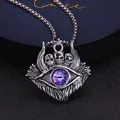 Gothic evil eye necklace pendant featuring purple gemstone and small silver skulls - Standard Type / Purple