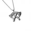 Detailed view of Viking double axe pendant with intricate Nordic engravings and chain - Double Axe Style