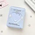 Classeur bleu ciel pour cartes avec fenêtre en cœur et motif ailes d'ange - Ailes Bleues