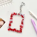 Acrylic photo card holder with red cherry patterns and heart-shaped metal clasp - Cherry