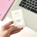 Minimalist purple Thank You aesthetic sealing sticker being held for size display - Yellow