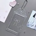 Transparent glitter card holder with white bow design and silver beaded chain - Bow
