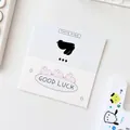 Linda tarjeta de embalaje de cartón azul y blanco con ilustraciones de conejos y texto - Cabecera de Tarjeta de Conejo